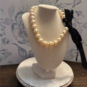 Elegant Pearl Necklace with Black Ribbon
